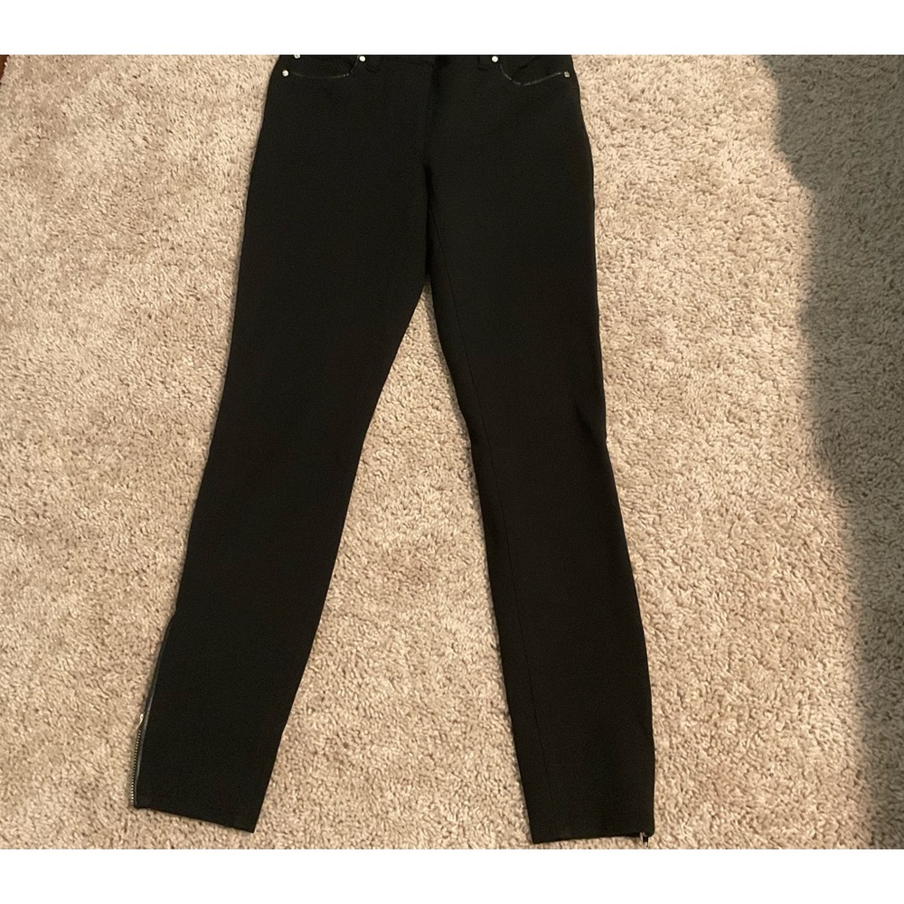 Gently used White House black Market pants with leather trim on pockets